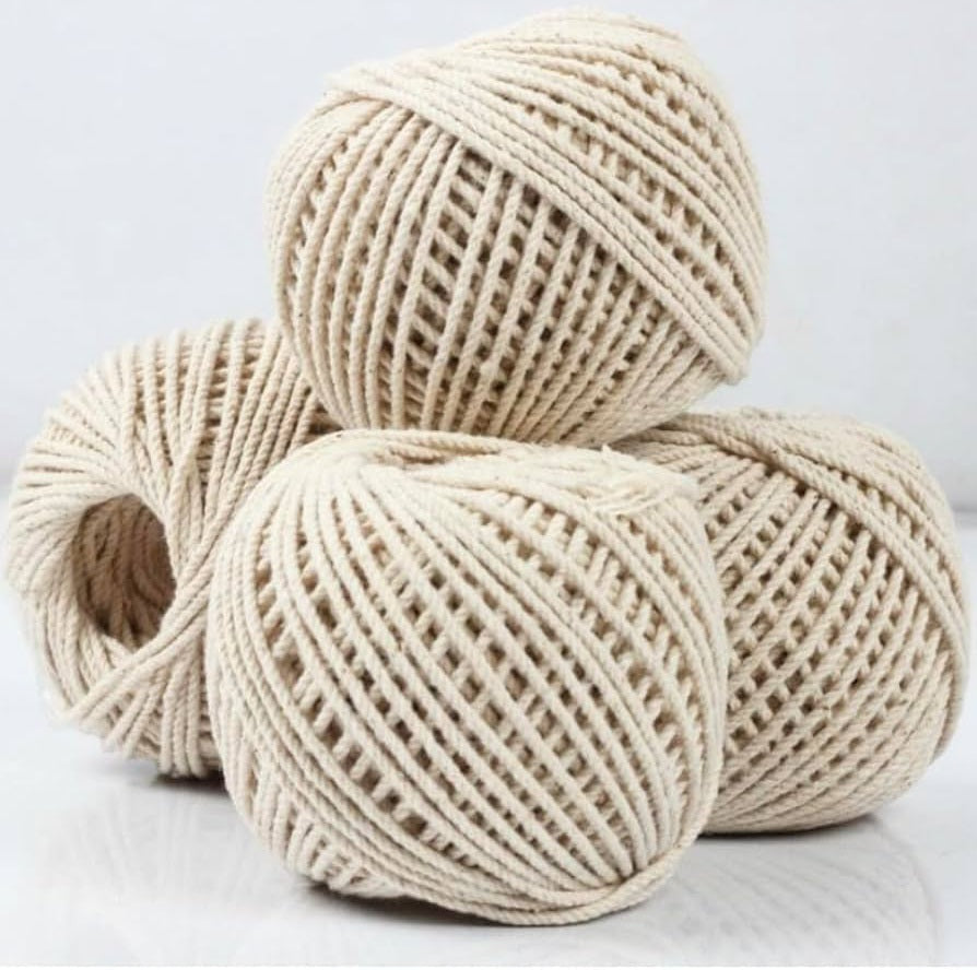 *Cotton Piping Thread - Dori* used for piping in dresses, clothes, pillow covers, etc., sold in a pack of 4 bundles with tailor chalk.
